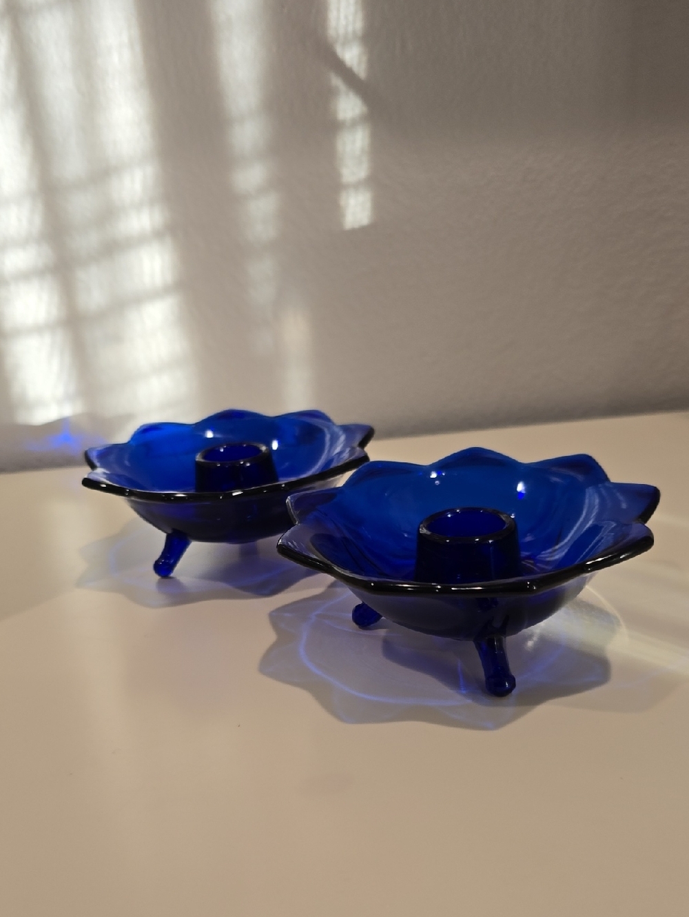 Vintage Fenton #848 cobalt blue three-toed lotus candleholder from the 1930s